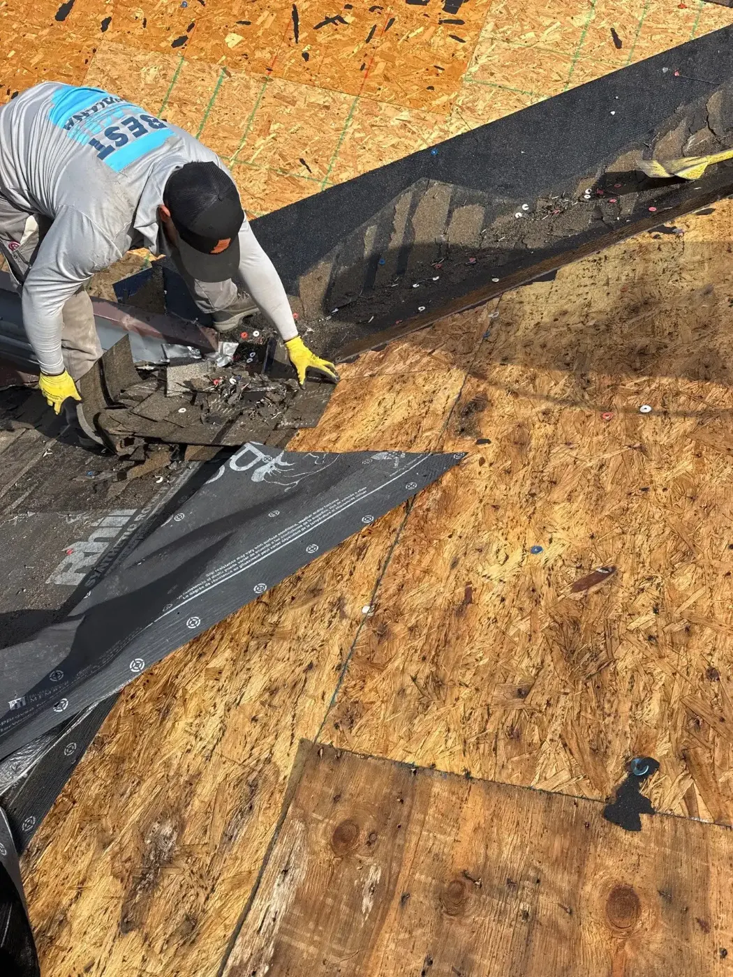 Tarping and dry-in on a Mount Comfort commercial roof